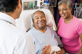 Photo of a doctor talking with a patient and his wife. Gifts by Estate Note. Photo of a doctor talking with a patient and his wife. Gifts by Estate Note.
