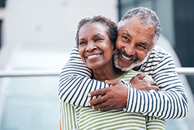 Photo of a couple smiling. Links to Donor-Advised Funds