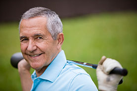 Photo of a man holding a golf club. Link to Life Stage Gift Planner Over Age 65 Situations.