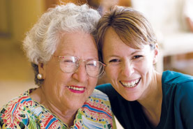 Photo of a nurse and patient. Link to Gifts That Protect Your Assets.