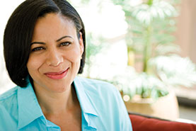 Photo of a woman smiling. Link to Gifts from Retirement Plans.