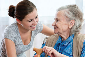 Photo of a nurse and patient. Link to Gifts of Life Insurance.